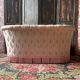 Small vintage 2-seater sofa from the 70s in Hollywood Regency style, satin pink.