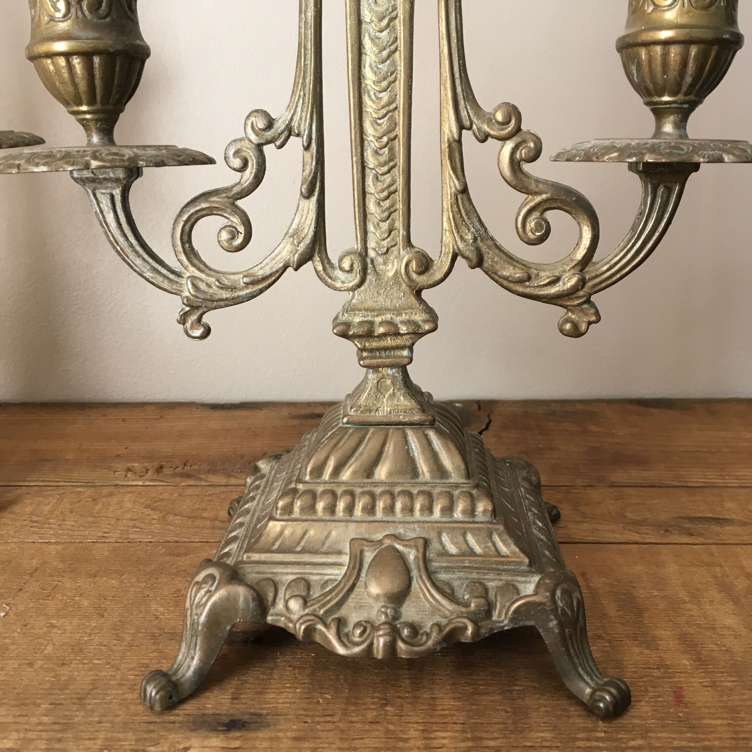 2 gold metal candlesticks