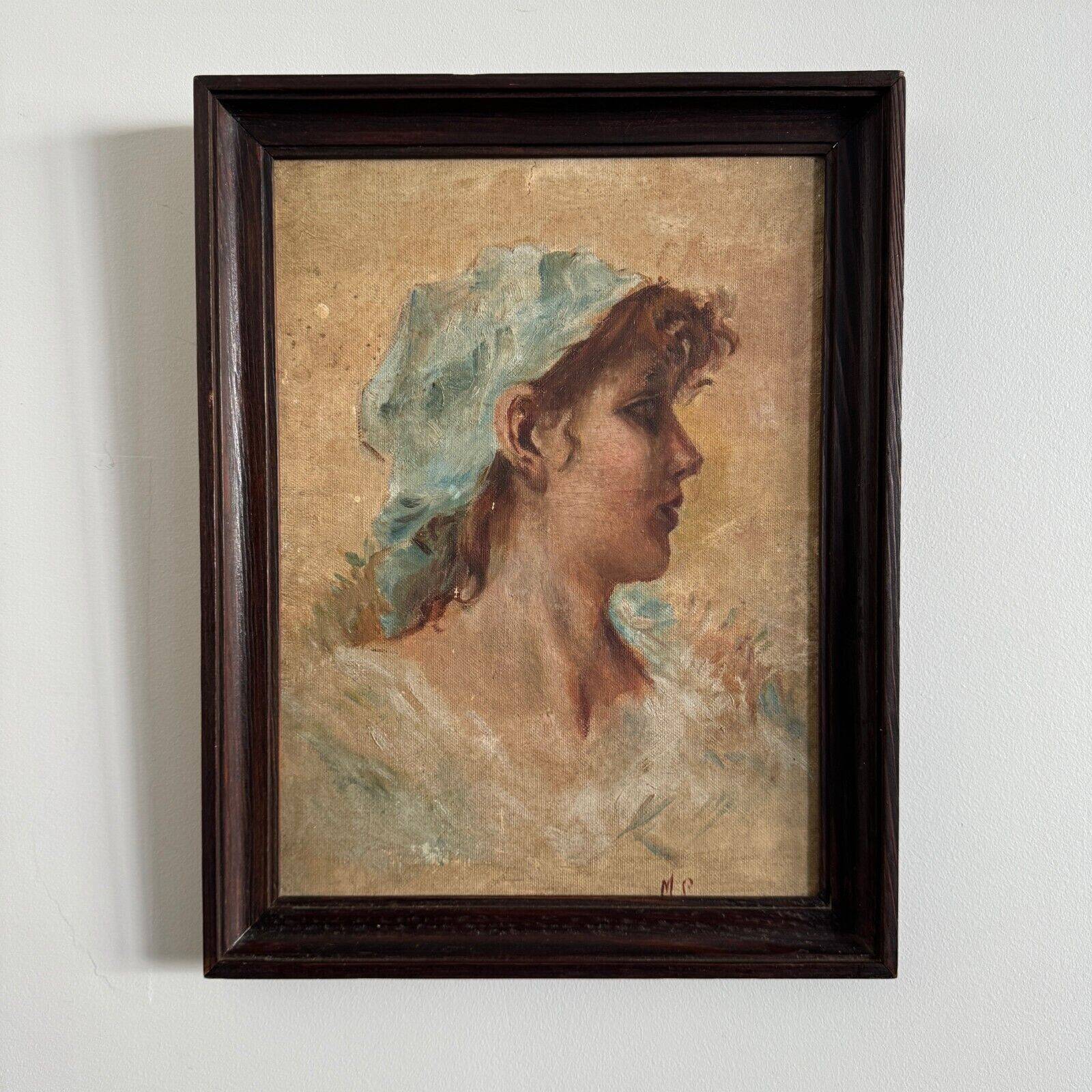 Oil on Isorel portrait of a young girl with a blue scarf, monogrammed MP