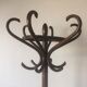Old curved wooden parrot coat holders