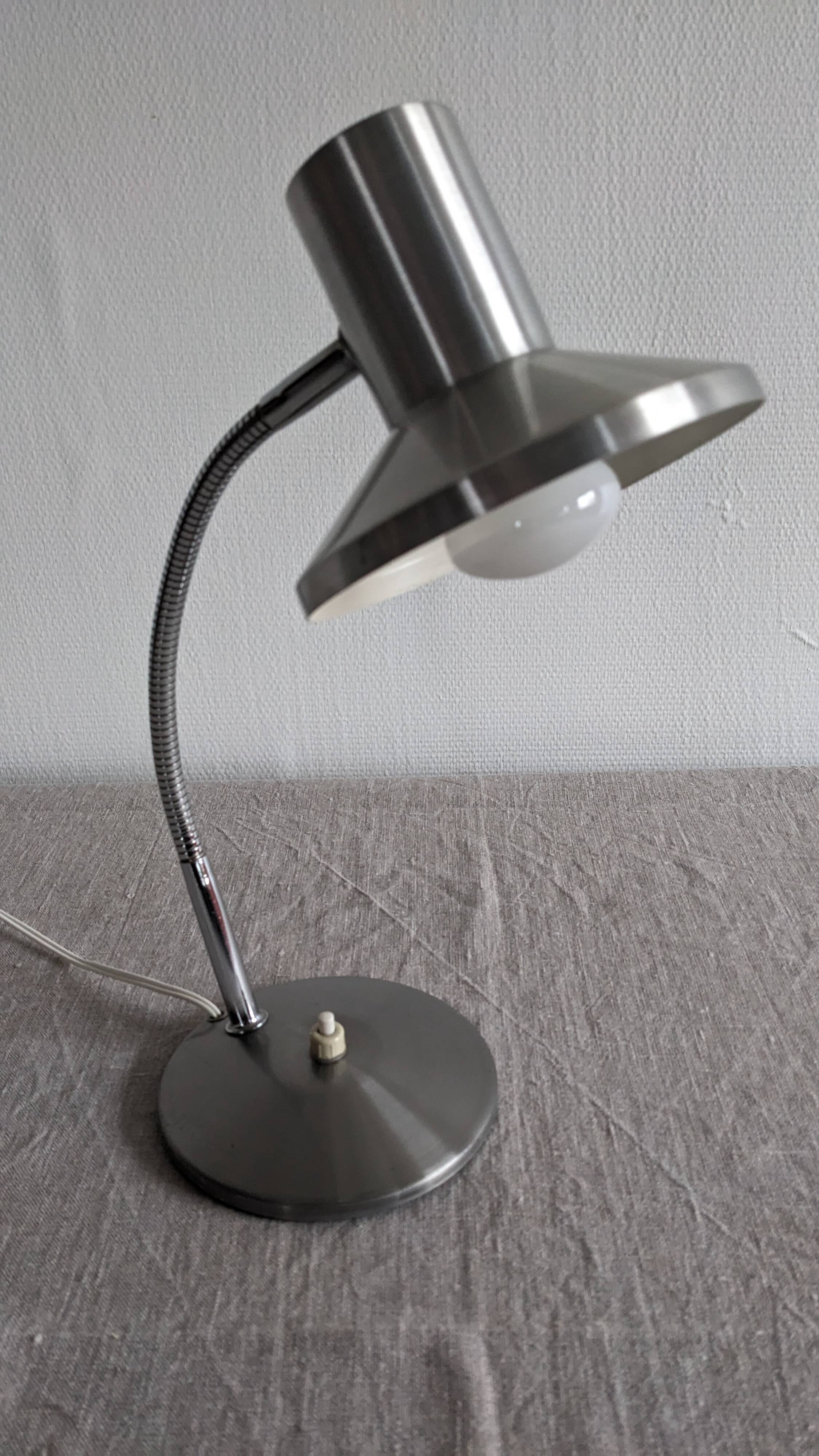 Articulated bedside lamp or wall light, France circa 1960.