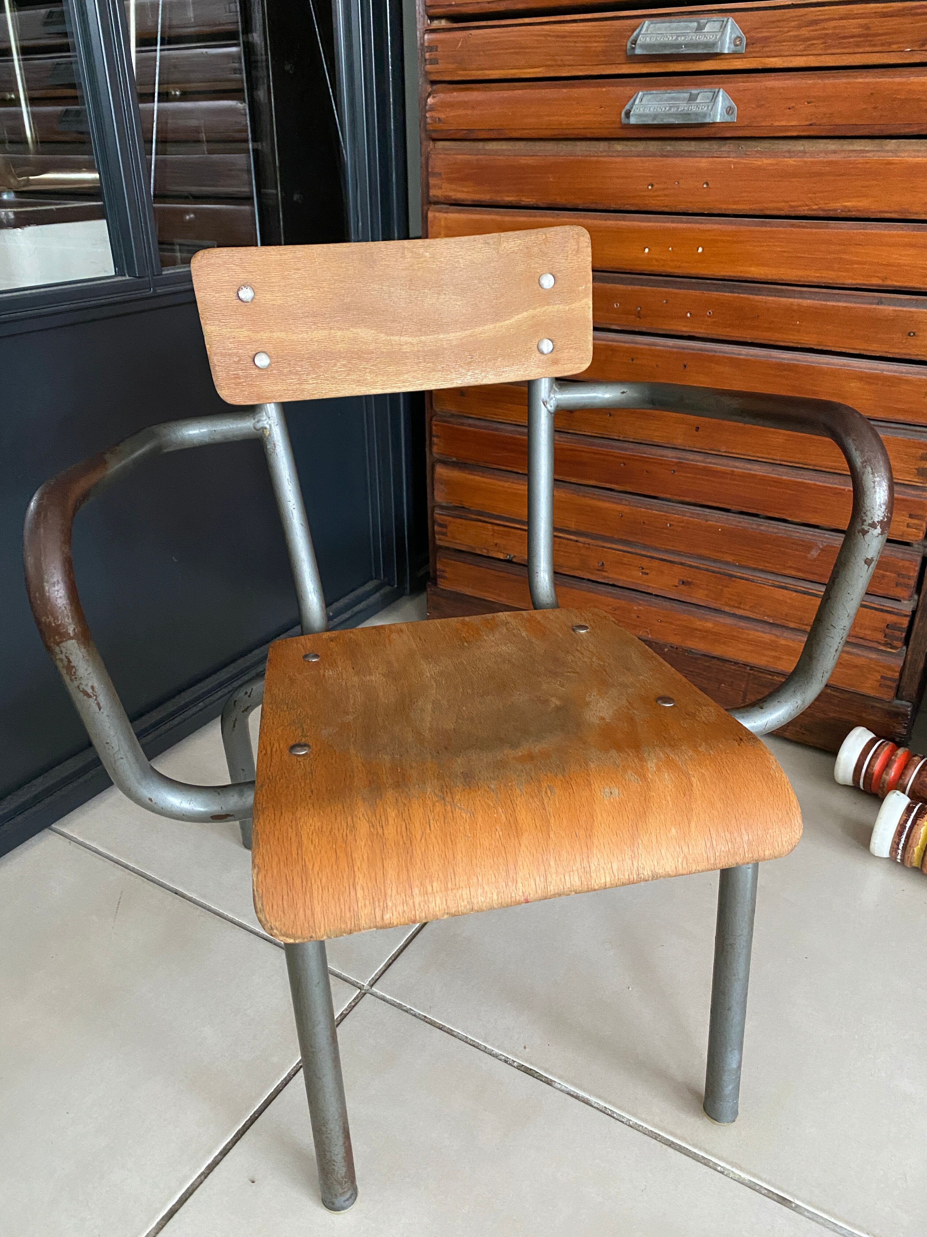 Old Mullca school chair with armrests