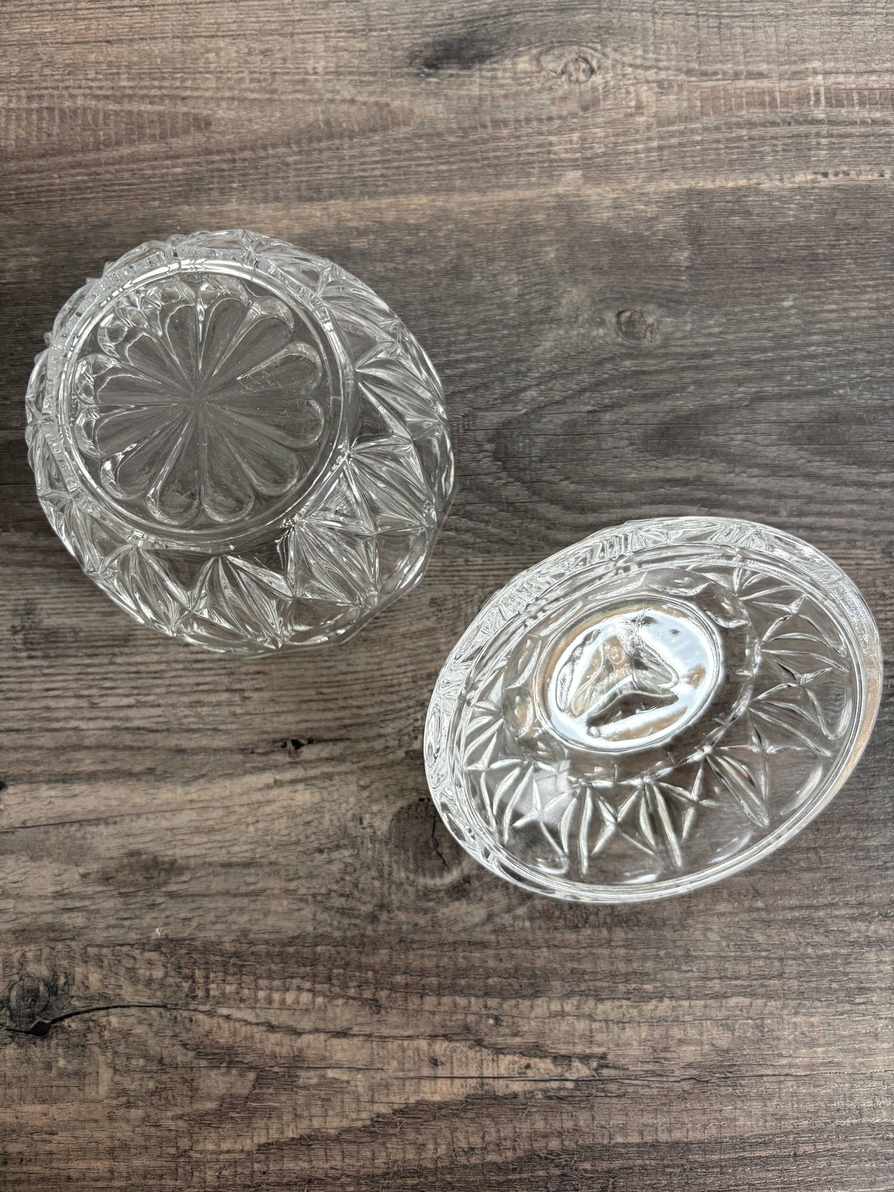 Antique covered jar in chiseled glass