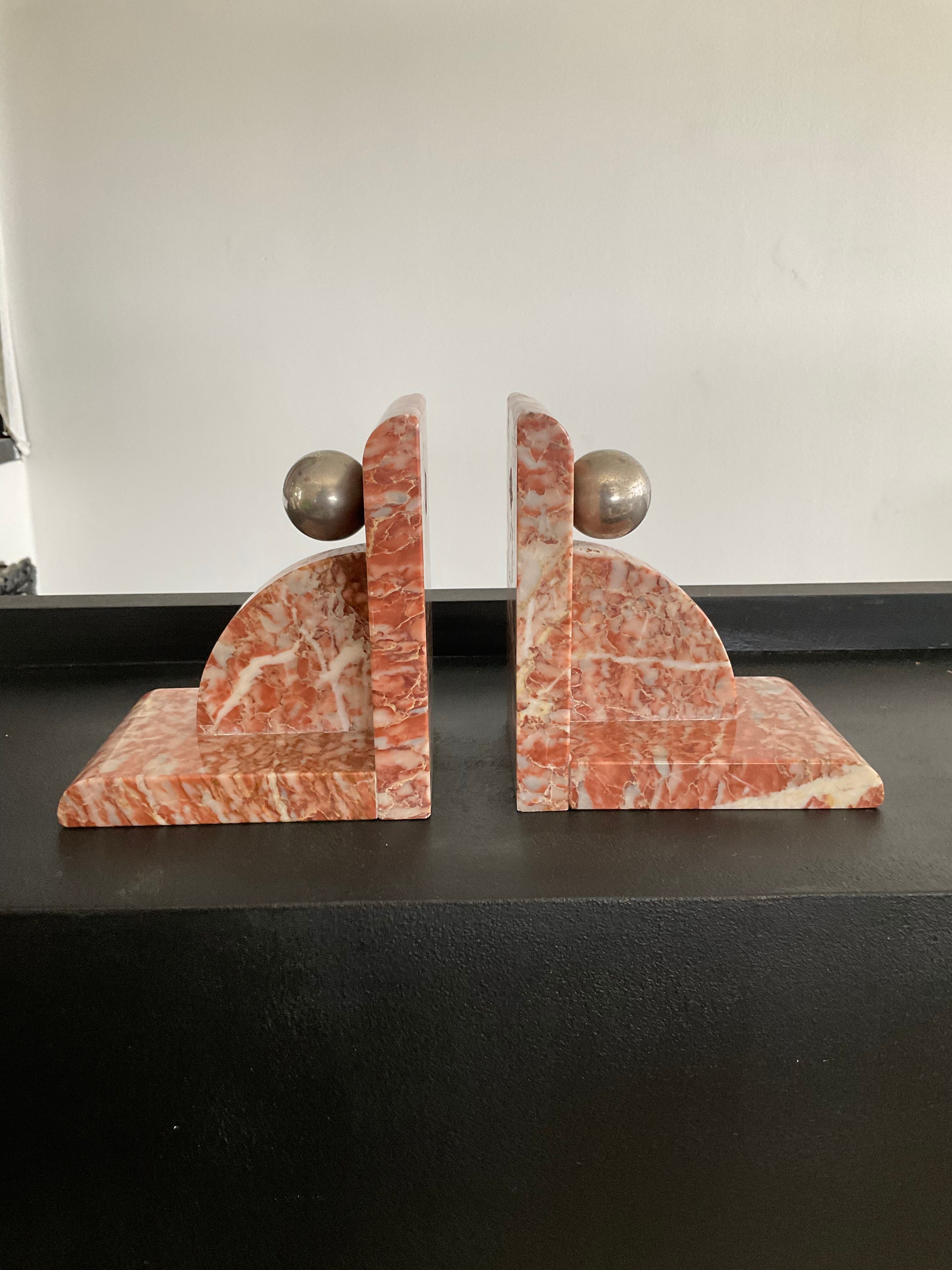 Pair of art deco series-books in marble and brass