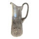 Transparent crystal pitcher, mid-century Hungarian, conical silhouette, sculptural handle and cut decoration.