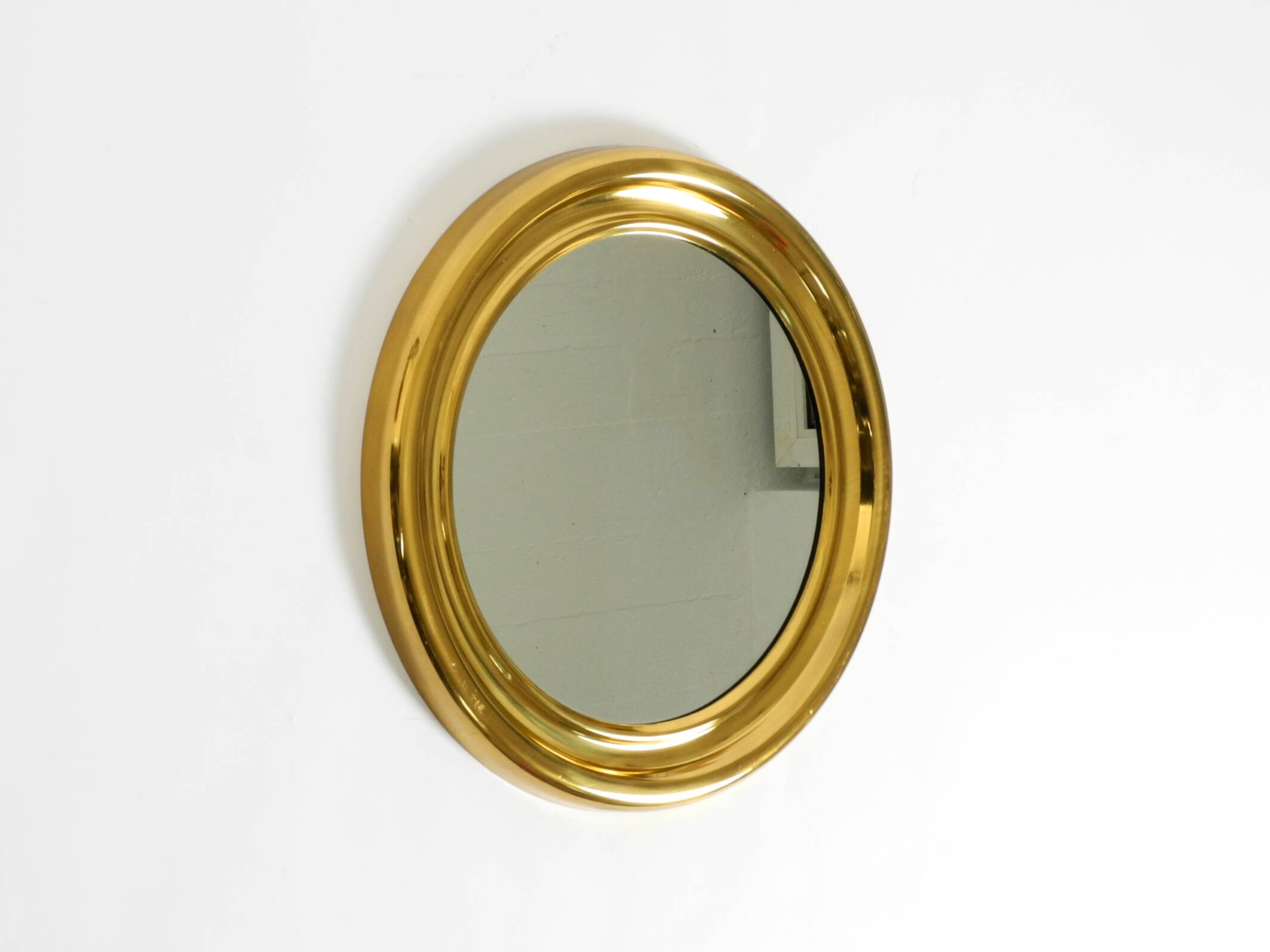 Beautiful, heavy, round Italian brass mirror from the 1960s