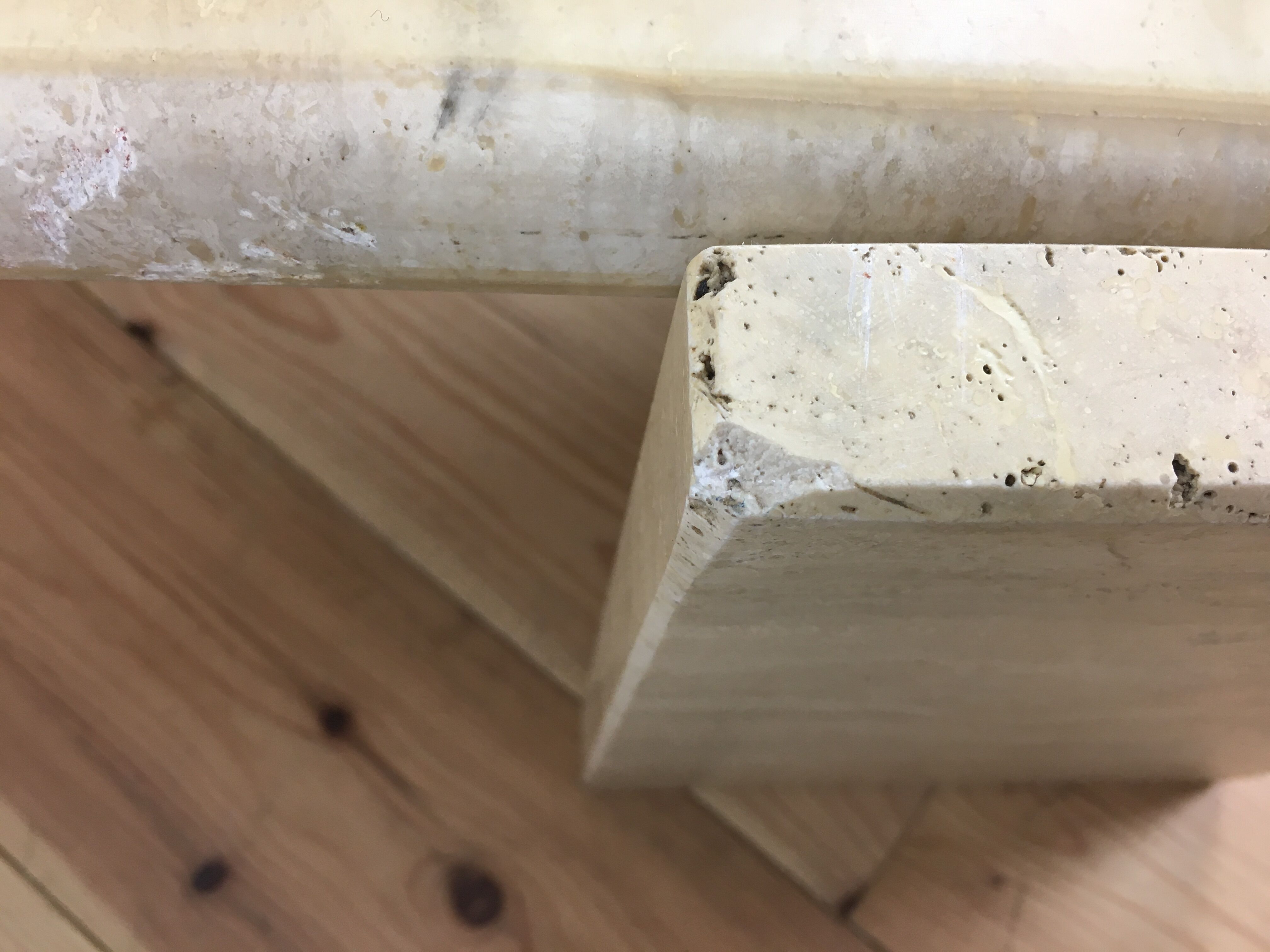 Bass table in travertine Roche Bobois