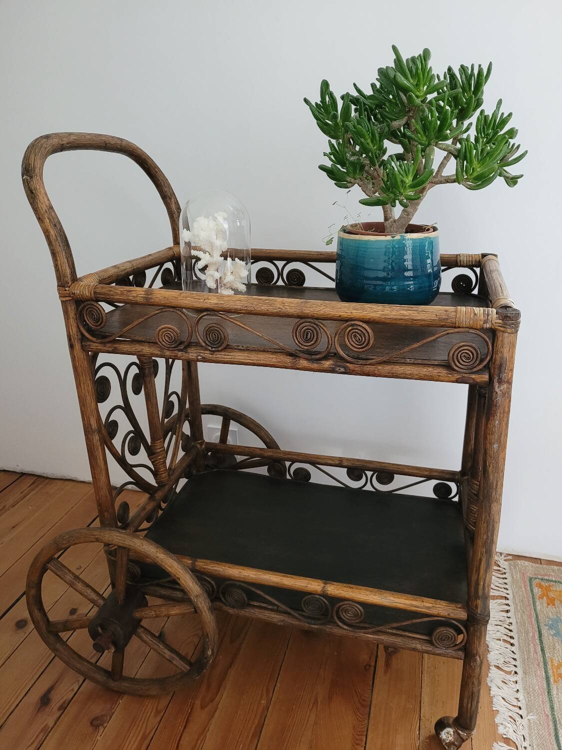 Bamboo and rattan dessert table in peacock style.