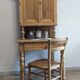 Former campaign secretary's desk in solid pine with a high cupboard.