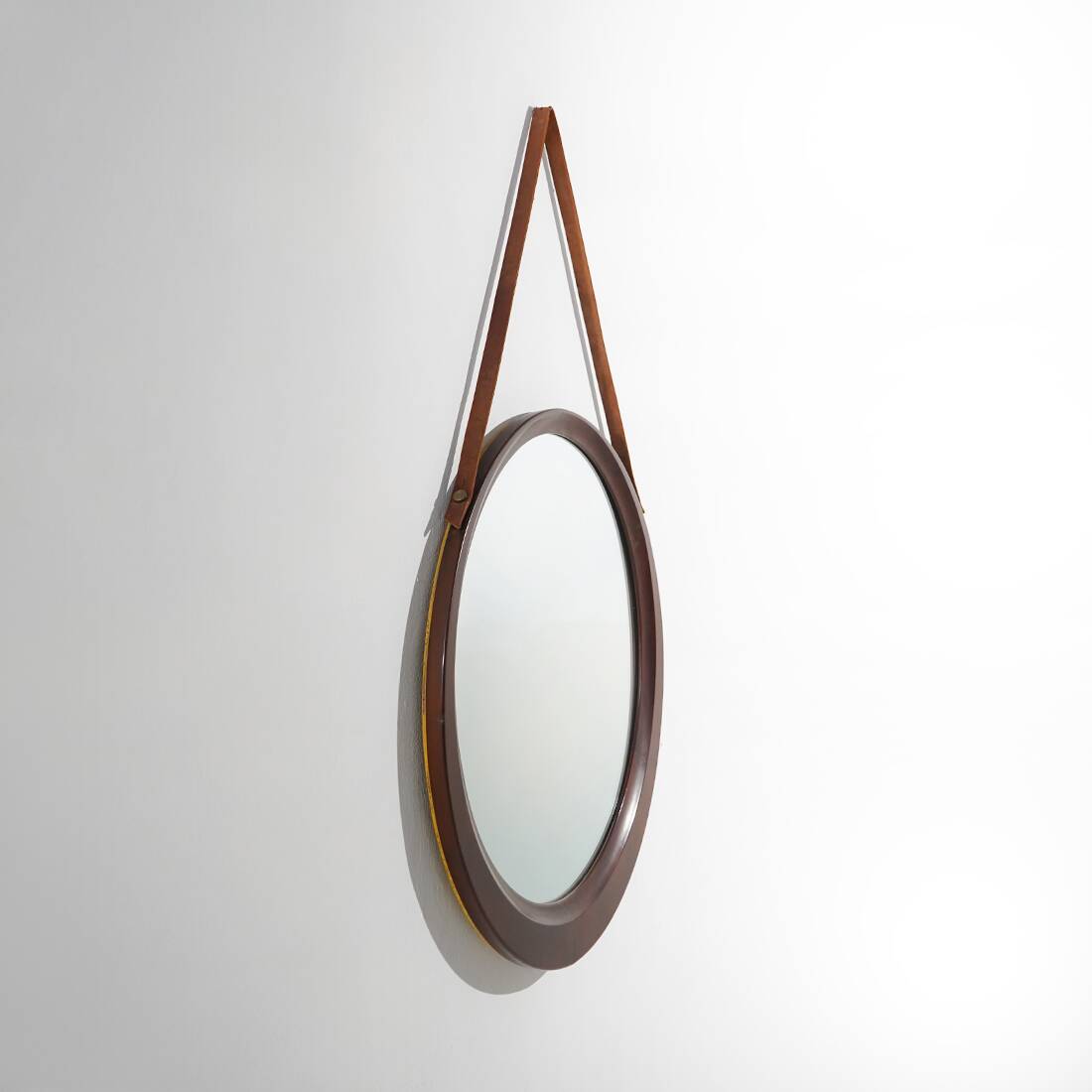 Round wall mirror with leather strap, 1960s
