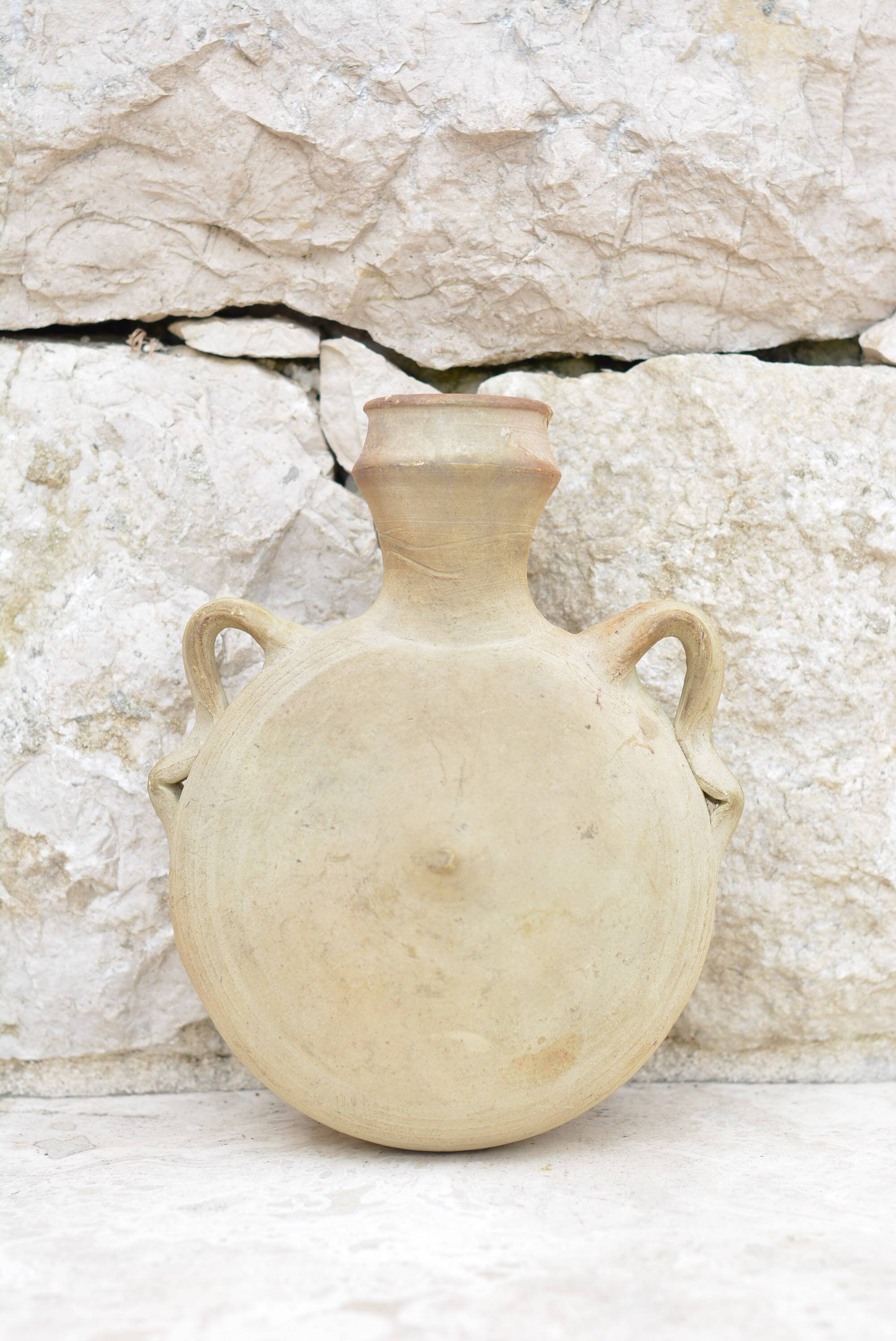 Round terracotta jug