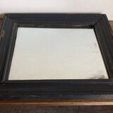 19th century blackened mirror with pitted glass 34cm x 40cm