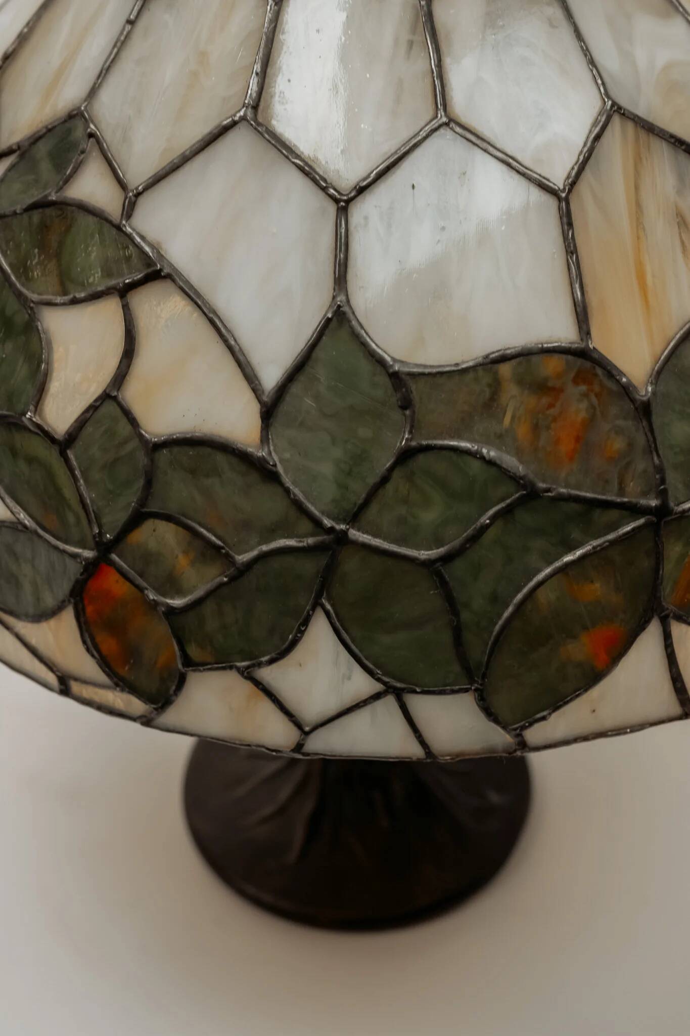 Tiffany-style table lamp with stained glass shade