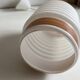 Opaline corrugated tube suspension