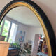 Miroir vintage ovale bois noir et doré