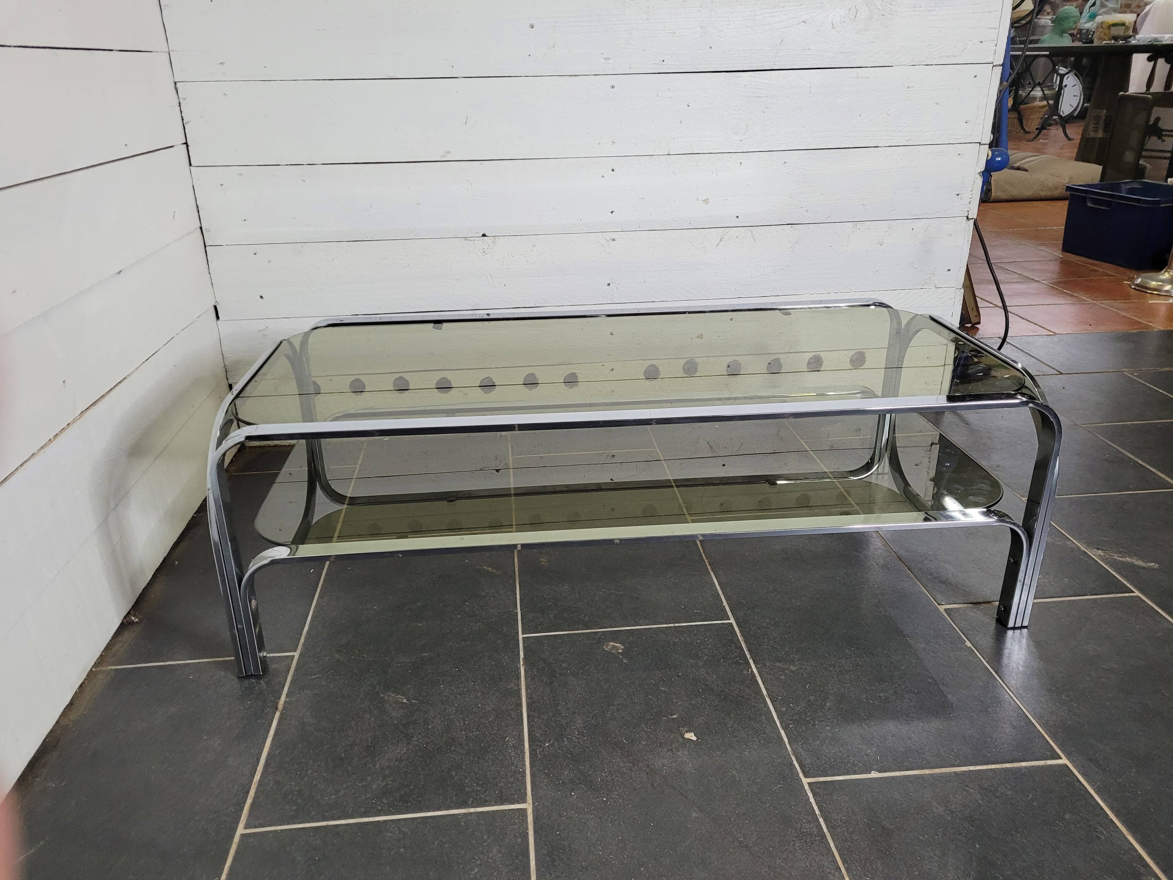 Chromed metal coffee table with smoked glass top from the 70s