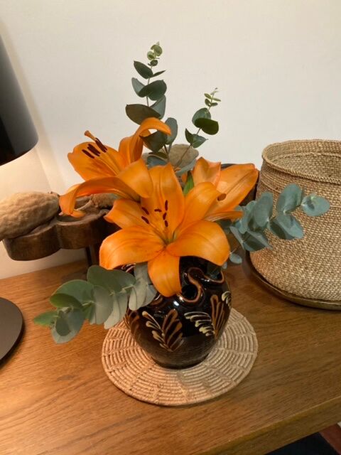Black glazed earth vase