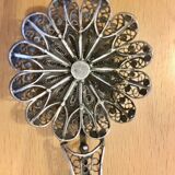 silver sprinkler spoon