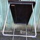 Design desk in formed glued laminated wood with chrome tubular base.