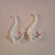 set of 2 vintage white cast iron hooks, small paint chips from the year