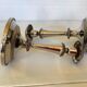 Pair of silver-plated zinc metal candlesticks