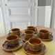 6 stoneware cups and 6 enamel plates