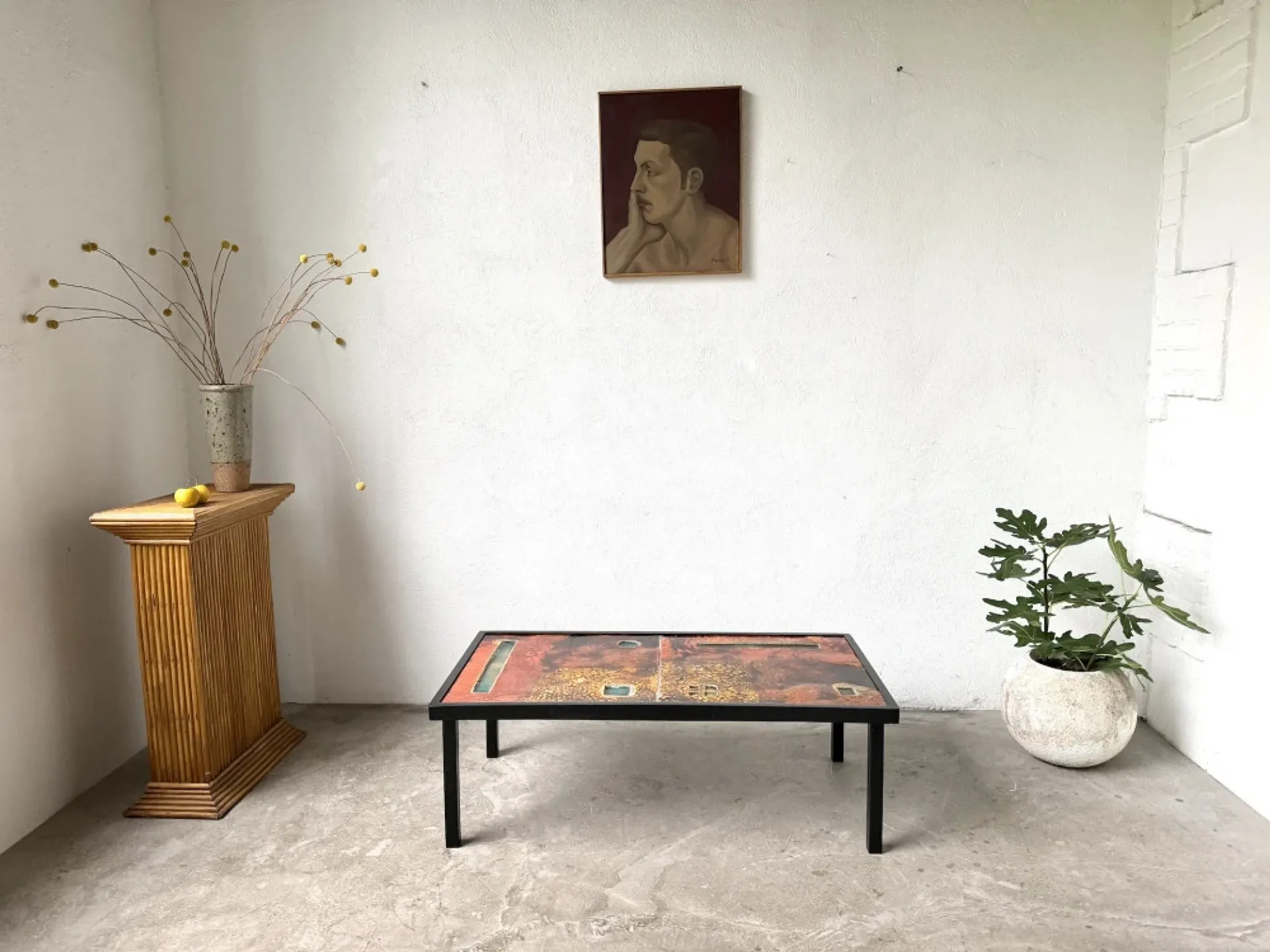 Coffee table by Robert and Jean Cloutier in enamelled lava and metal, 1950s.