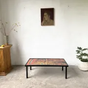 Coffee table by Robert and Jean Cloutier in enamelled lava and metal, 1950s.