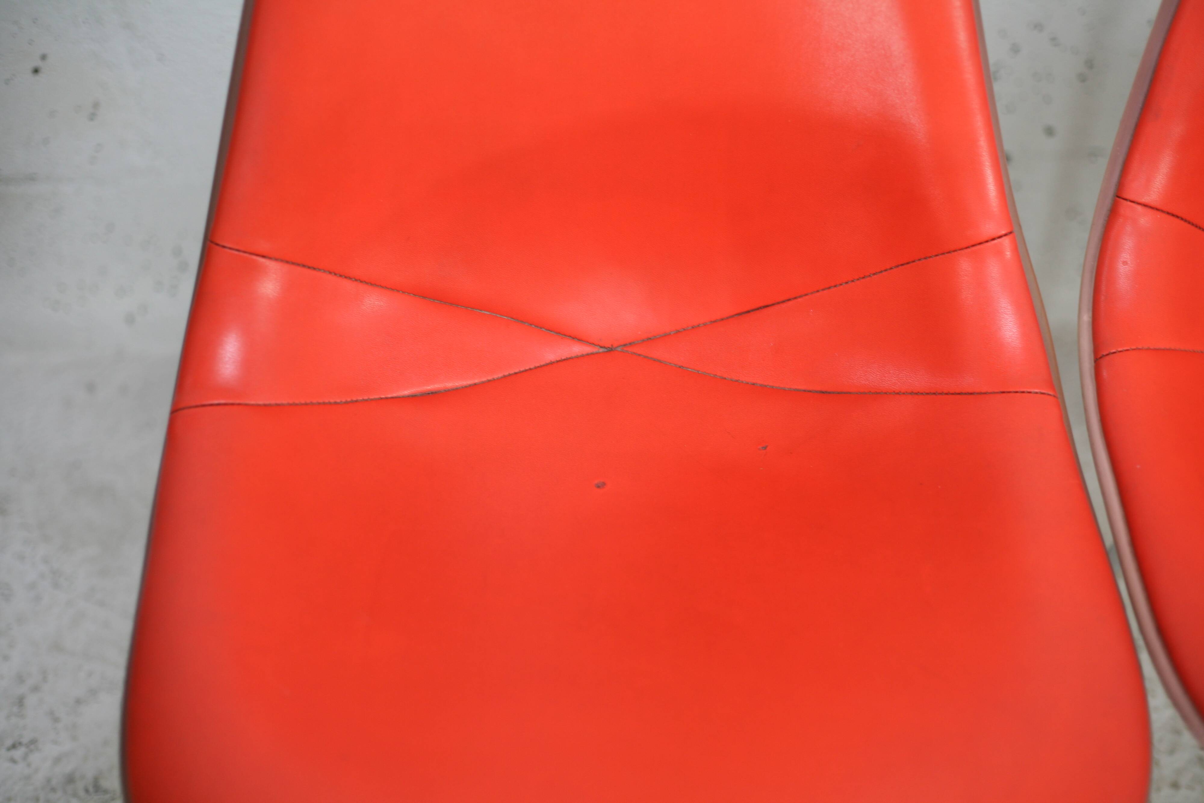 Ray & Charles Eames, Herman Miller edition, set of 4 orange chairs. Circa 1960