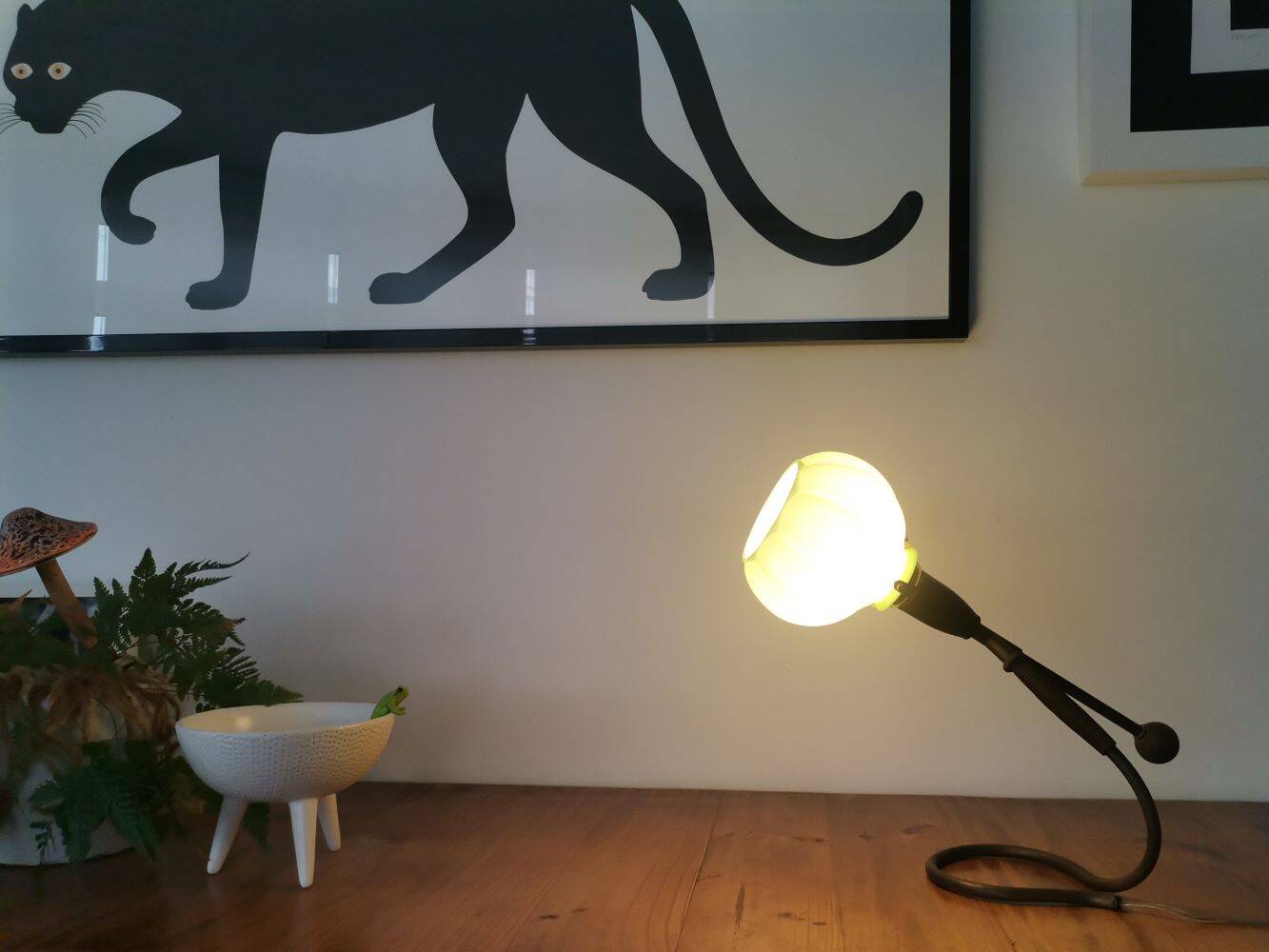 Modernist green cased glass and brass articulated table lamp