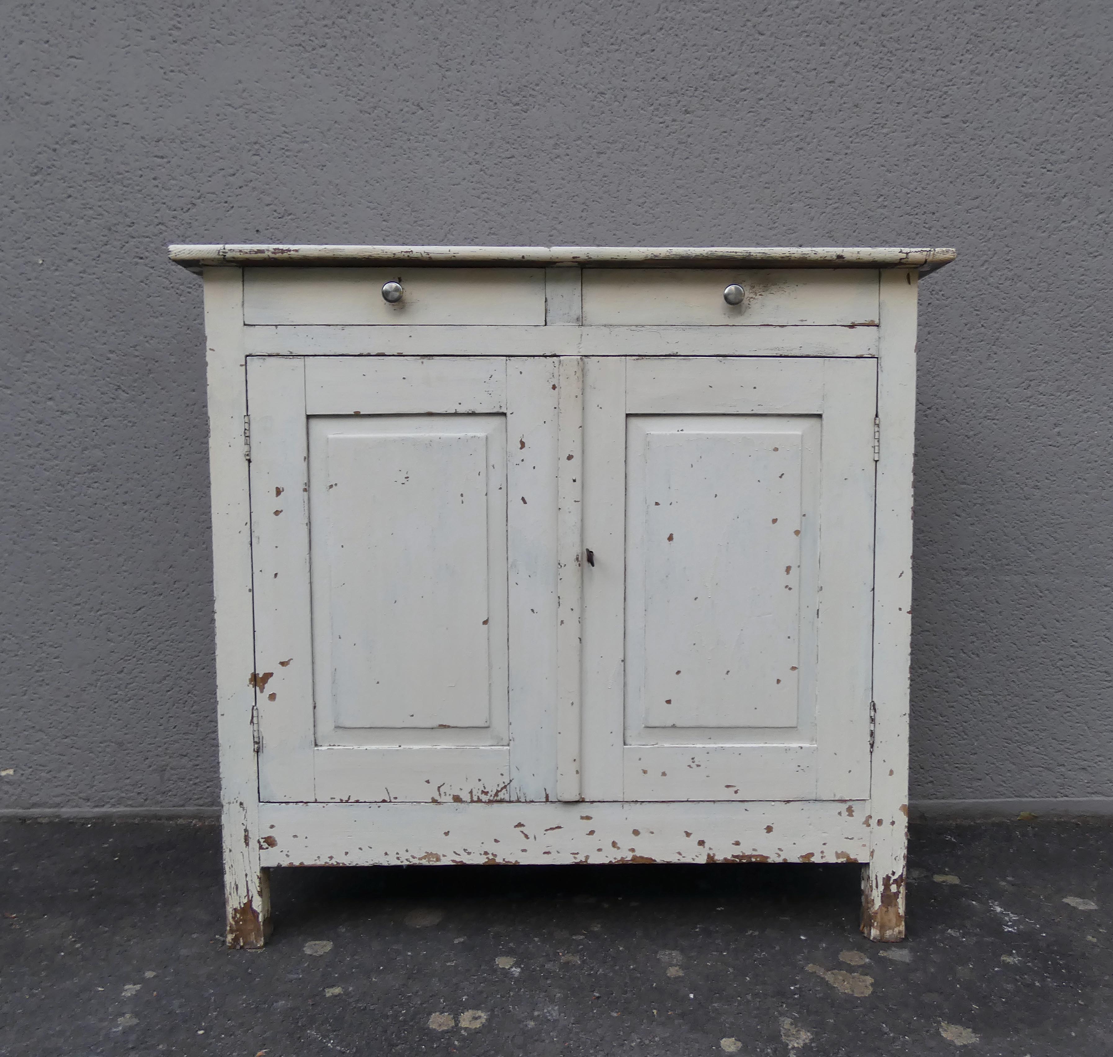 Old patinated wooden sideboard
