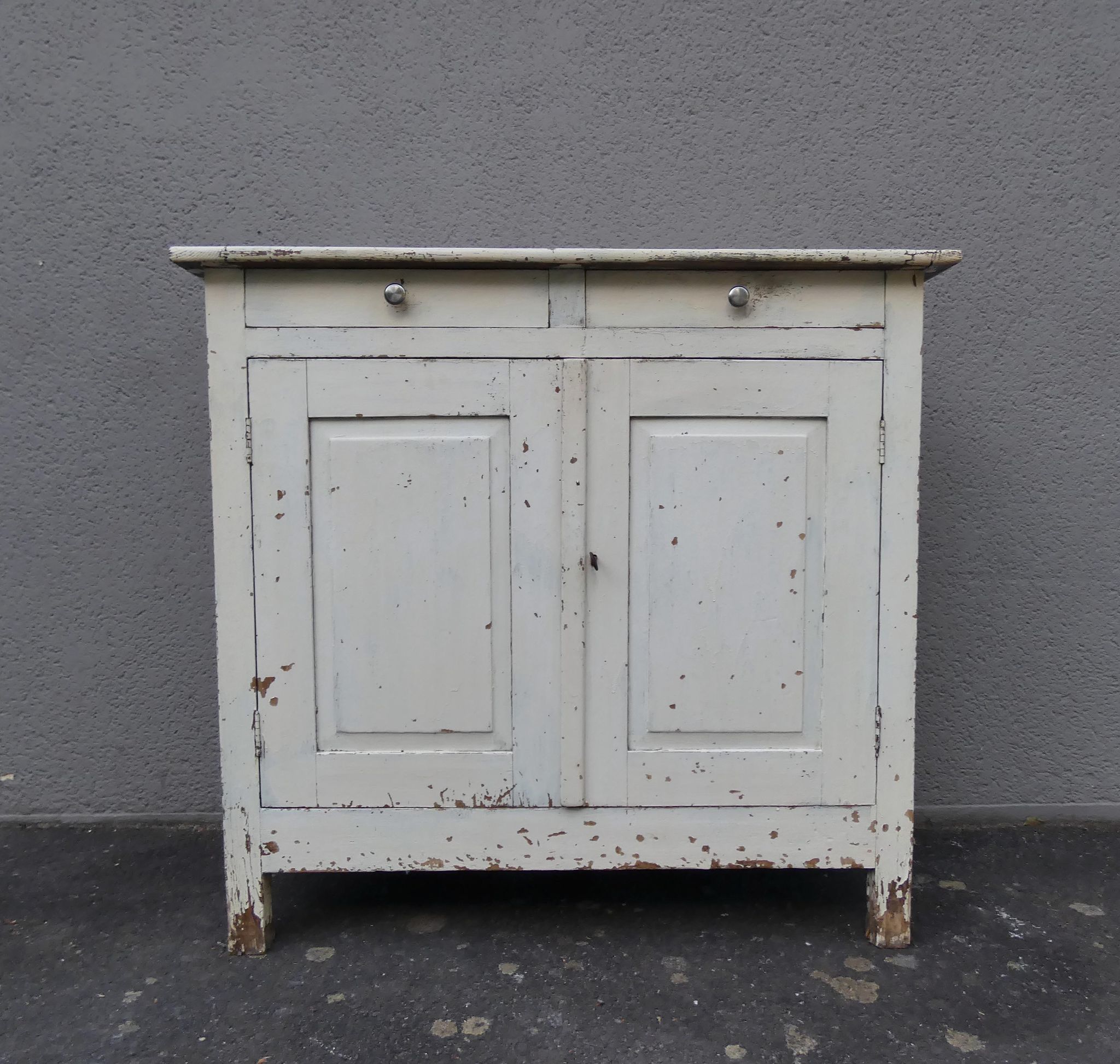 Old patinated wooden sideboard
