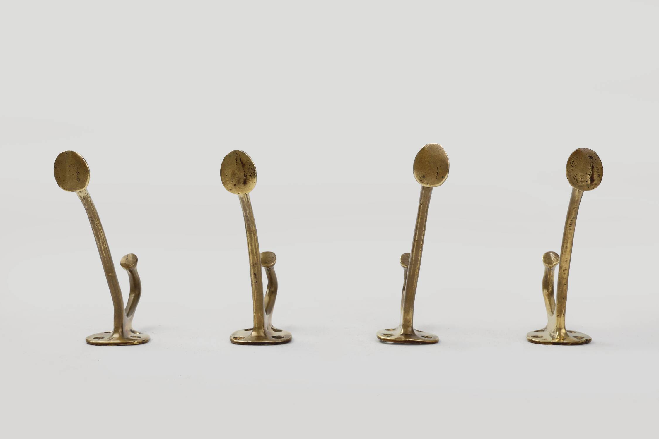 Set of 4 Adolf Loos brass art nouveau wall hooks, Vienna, Austria ca. 1910