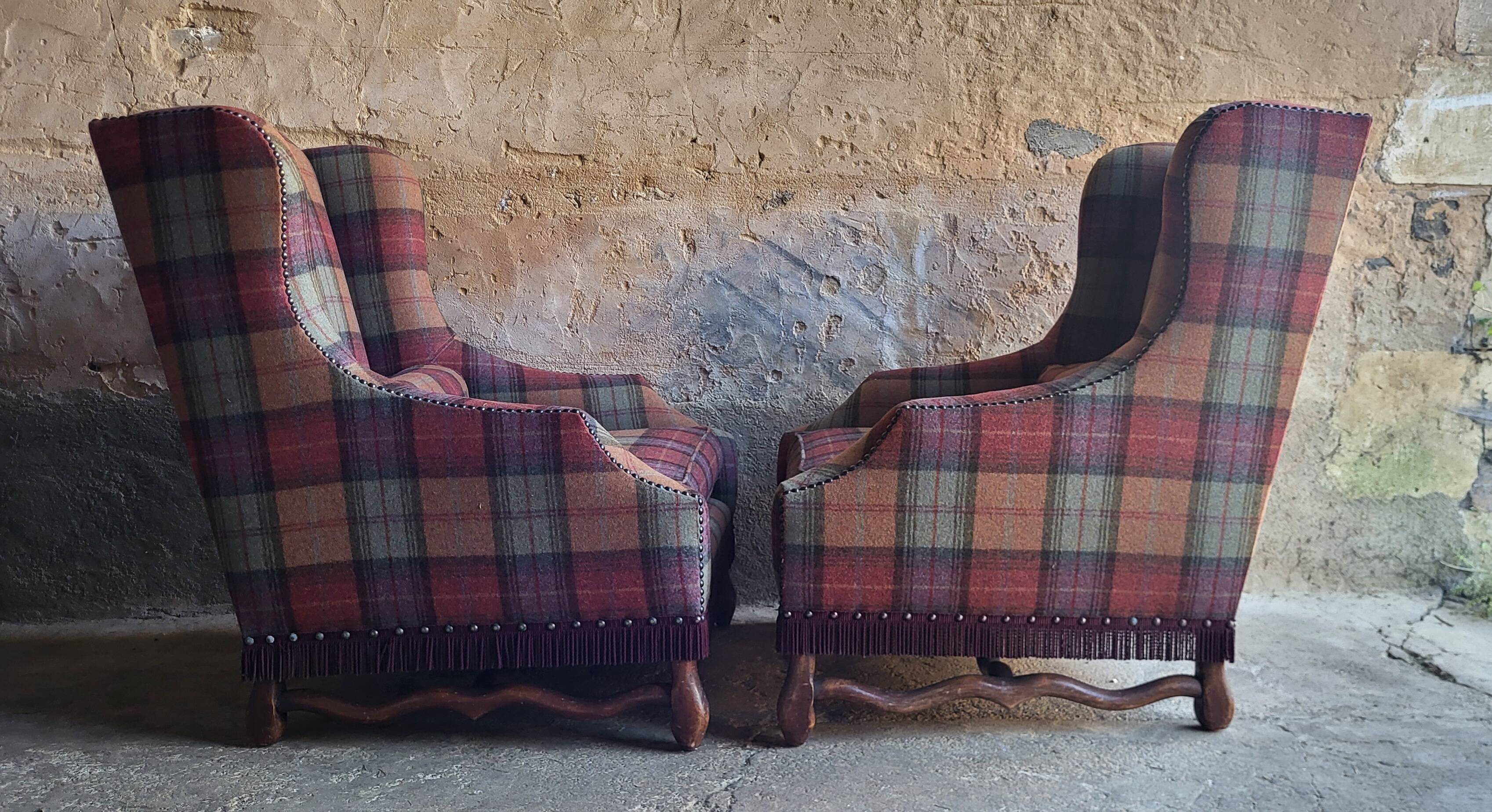 Pair of Louis XIII wingback armchairs