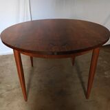 Table ronde en palissandre avec rallongedes années 70