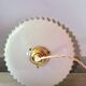 Suspension in pleated opaline