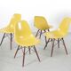 Set of 4 DSW chairs by Charles Eames - yellow fibreglass edition by Herman.
