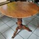 Three-legged side table in solid fruitwood.