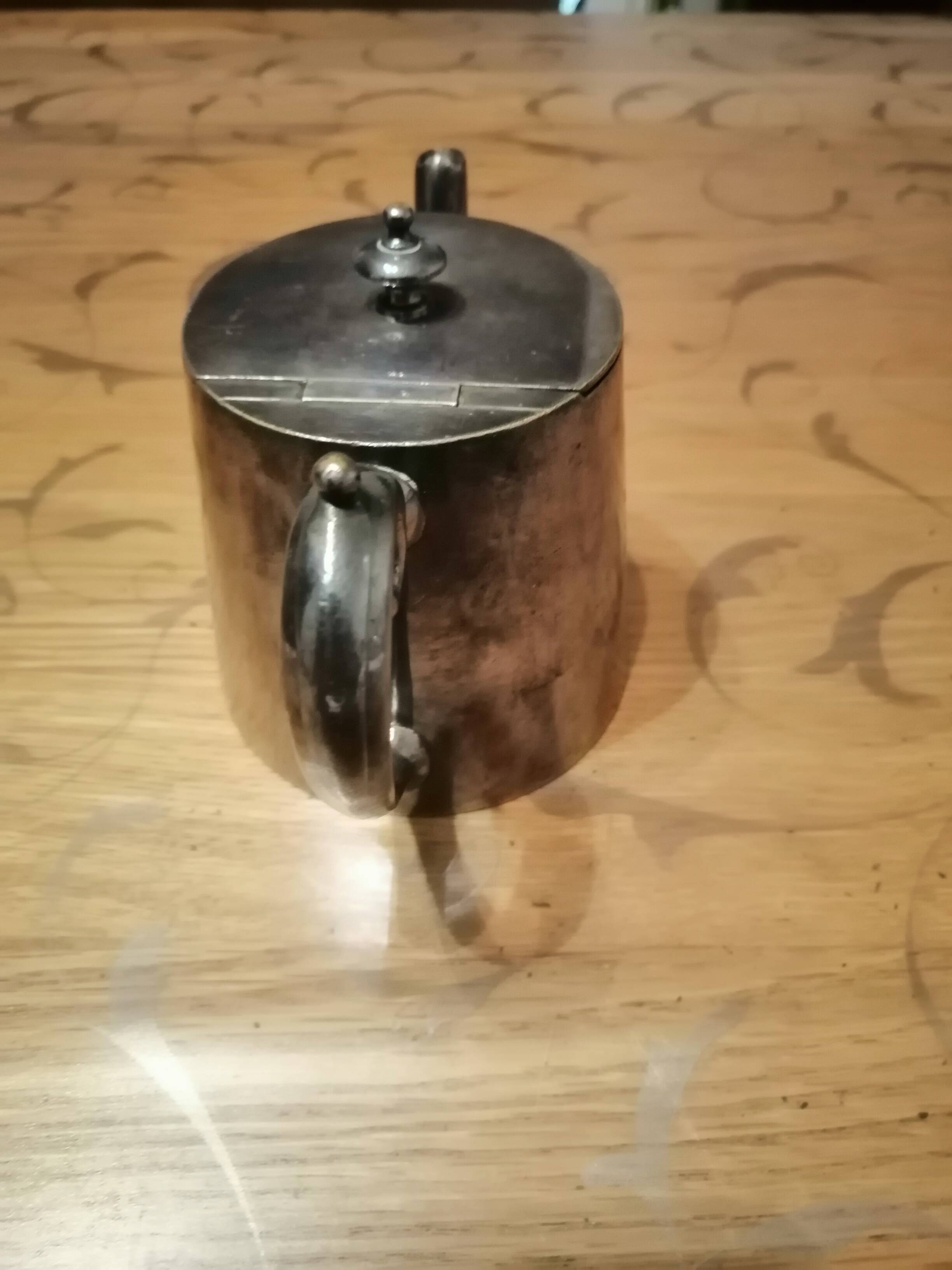 small silver-plated teapot