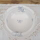 Compotier on porcelain pedestal decoration pale blue flowers