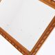 Small old wooden mirror with carved frame