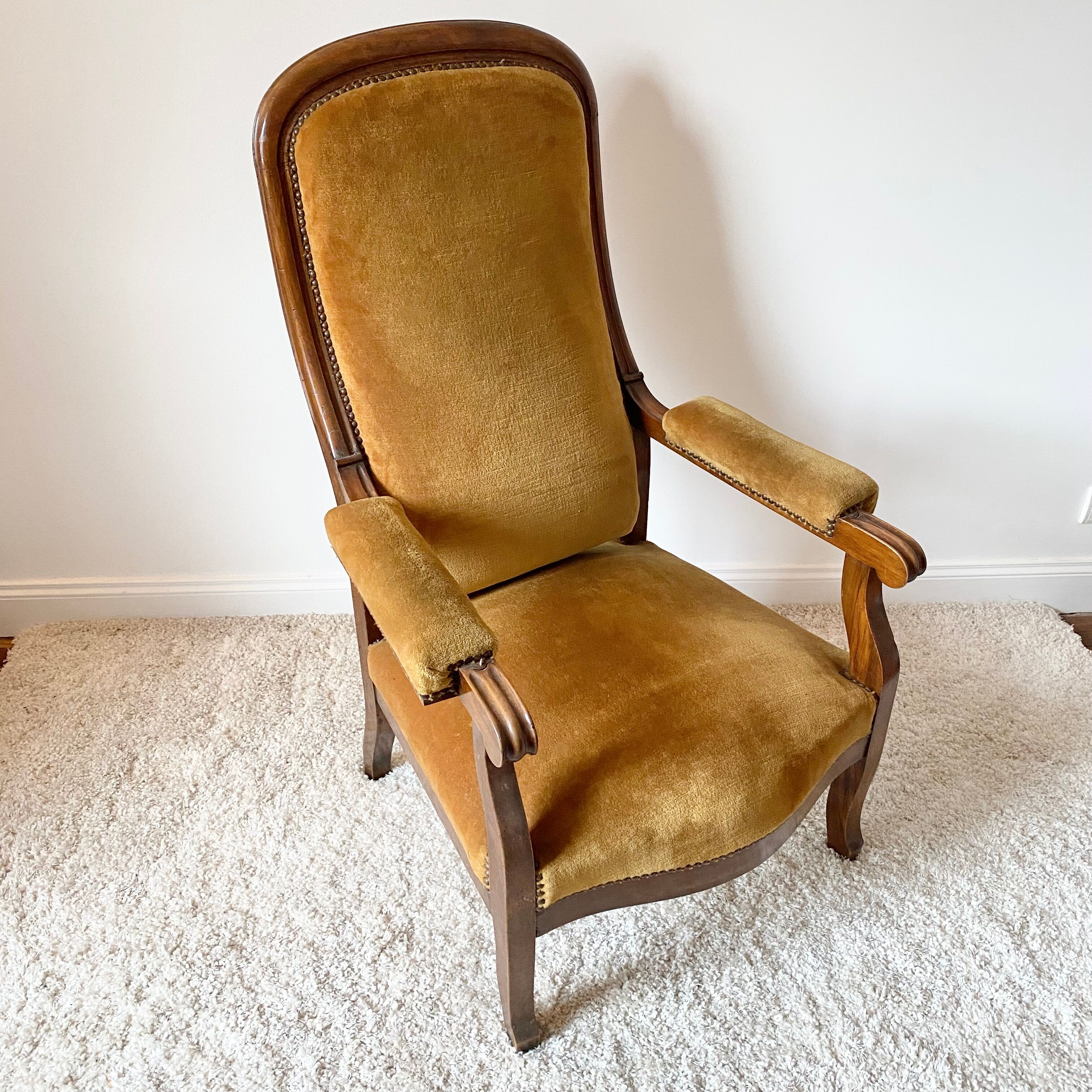 Antique Voltaire armchair