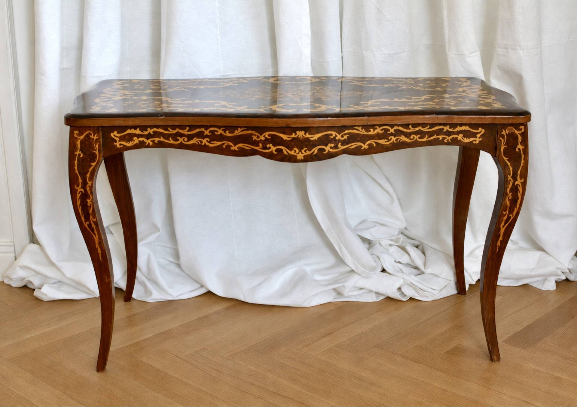 Antique coffee table with floral marquetry, Louis XV style.