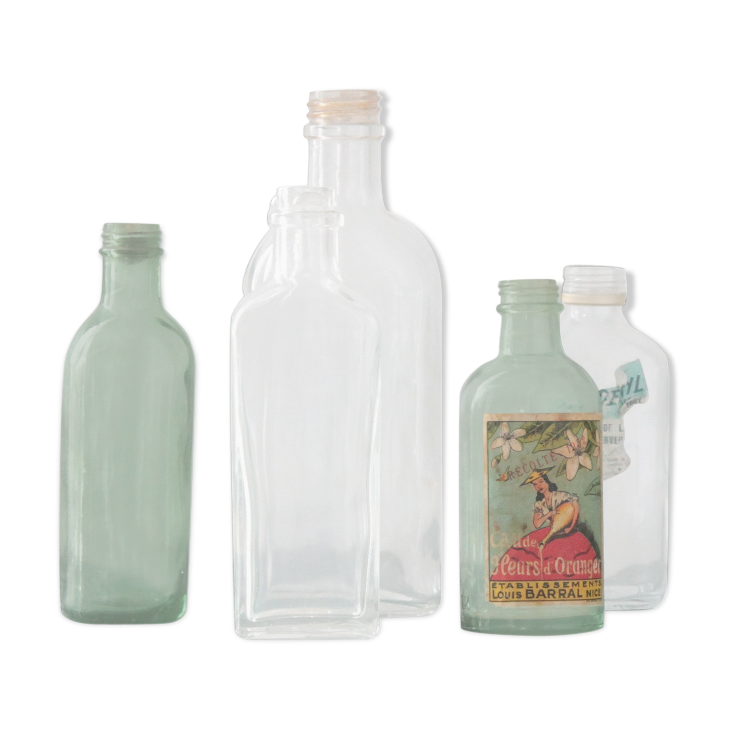 Collection de 7 Bouteilles anciennes en verre
