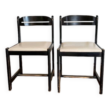 Pair of black chairs + white imitation