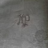 Old damask tablecloth with monogram