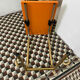 Table d’appoint vintage Werzalit – années 60/70 – plateau orange
