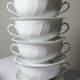 5 cups with two handles, Limoges porcelain Bernardaud "Palm"