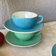 Multicolored Digoin cups looking basket weaving