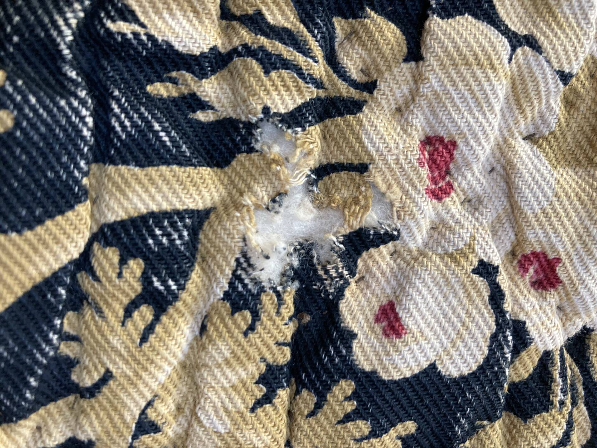 Antique hand-stitched boutis bedspread, floral fabric, 19th century.
